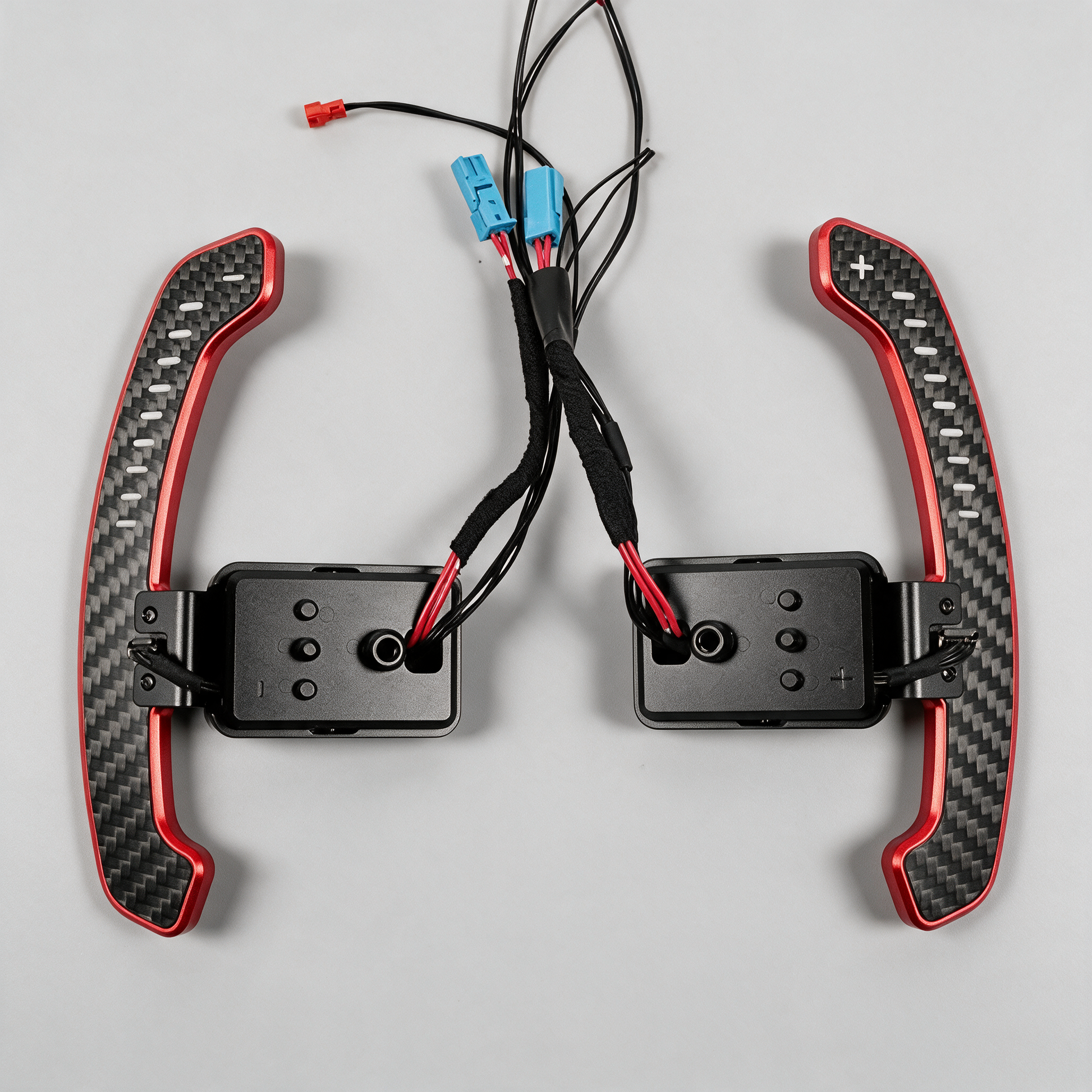 Par de levas de fibra de carbono con módulos y cableado incluidos