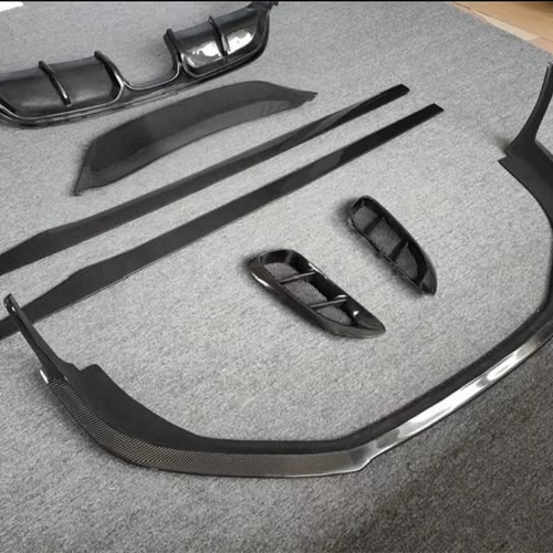Kit carrocería carbono seco Porsche 718 con rejillas — foto real